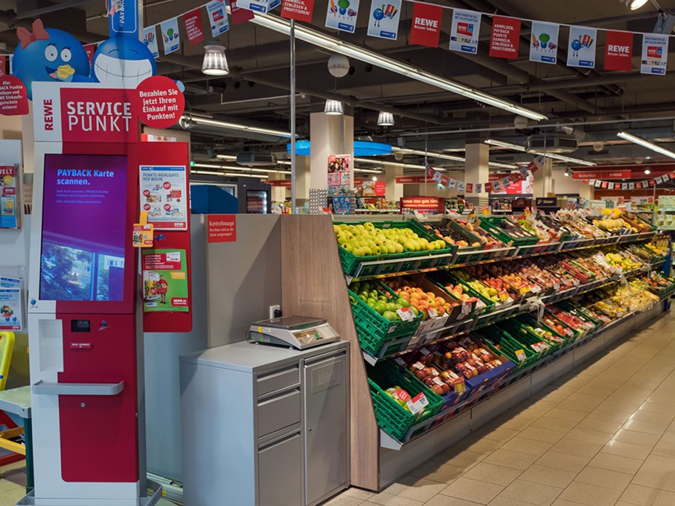 Eingangsbereich mit dem REWE Service Point